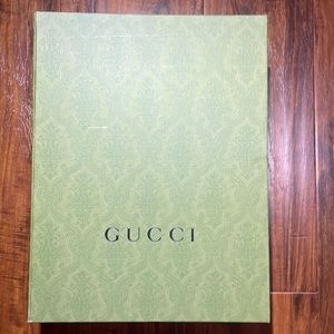 Fairly new gucci box. Gift wrapping paper barely touched.